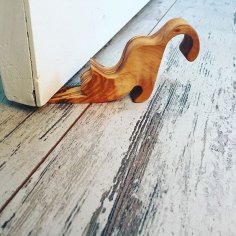 Kedi şeklinde kapı takozu Ücretsiz Vektör