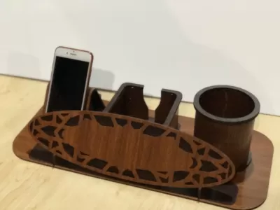 Lazer Kesim Masa Organizeri Kalem Telefon Tutucu Ücretsiz Vektör CDR çizimi