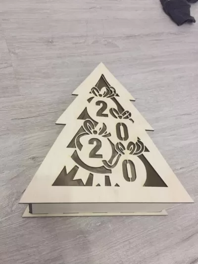 Lazer Kesim Yeni Yıl Noel Ağacı Şeklinde Kutu Ücretsiz Vektör CDR çizimi