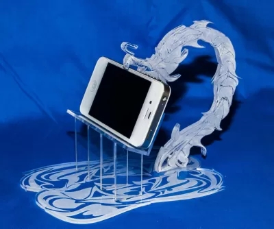 Lazer Kesim Ejderha Telefon Tutucu Ücretsiz Vektör CDR çizimi